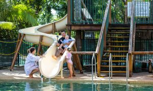 Family on a waterslide at Cape Hillsborough Nature Resort